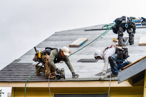 Professional Roofing technician working in Jewett City, CT